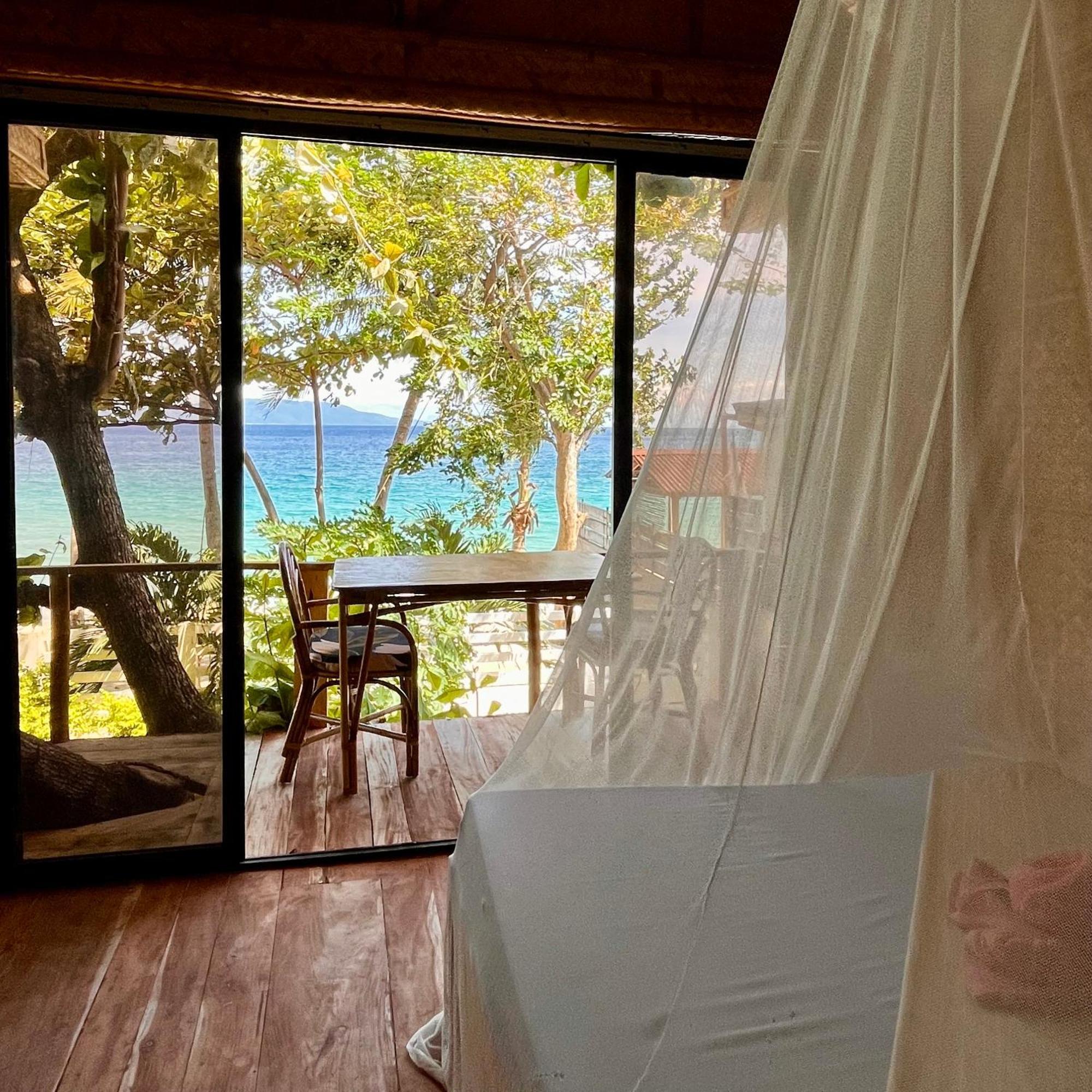 Amami Beachfront Villa With Private Beach Puerto Galera Bagian luar foto